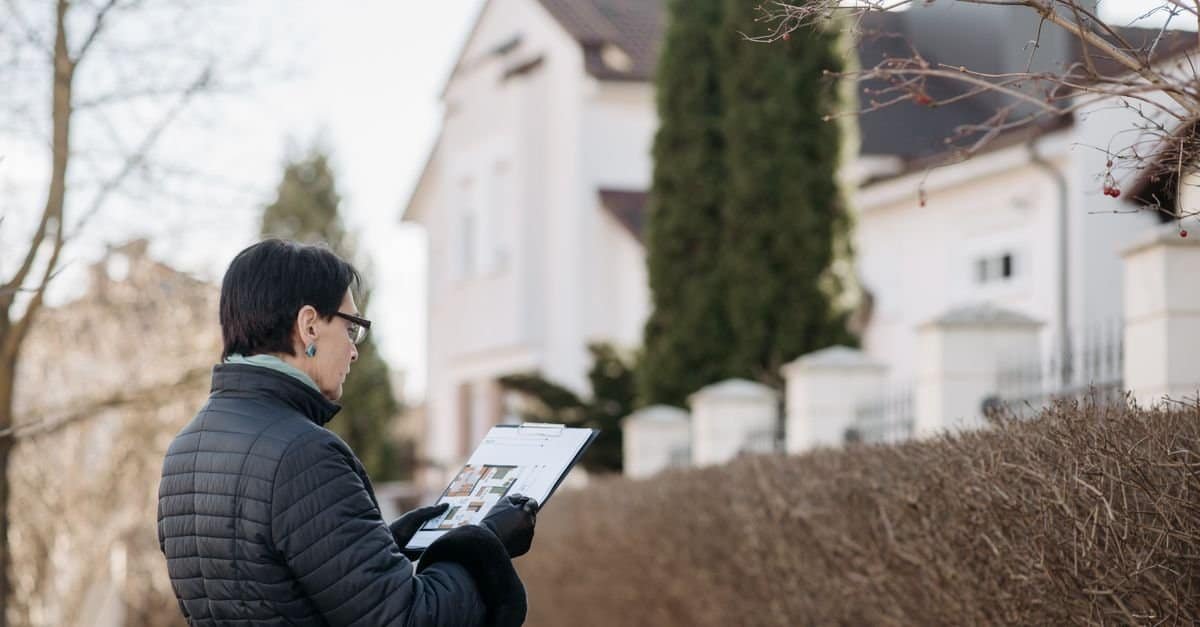 Real estate agent reviewing AI-generated leads on a laptop